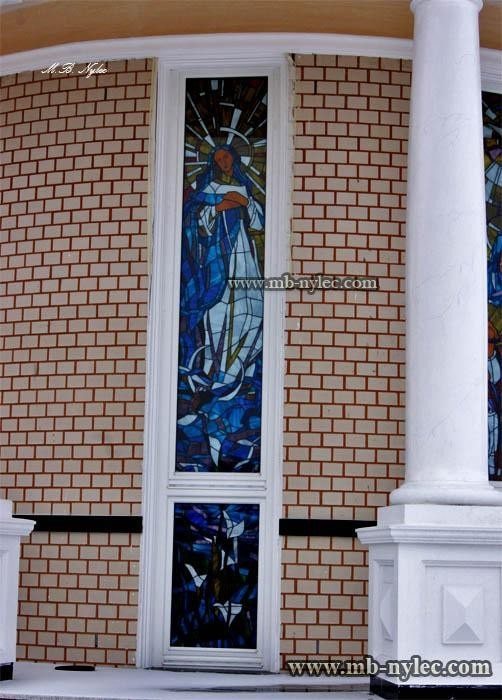 Tiffany-style stained glass window in the wall of a chapel