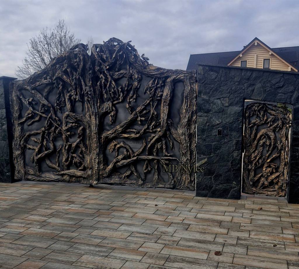 Tree gate with a matching wicket gate and stone pillars