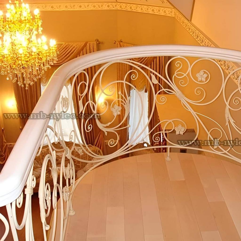 Traditional white balustrade BA18 curving around a landing under a crystal chandelier