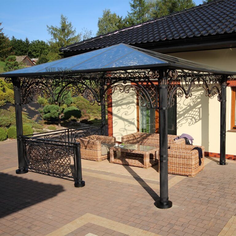 Wrought iron gazebo with garden furniture and a low railing