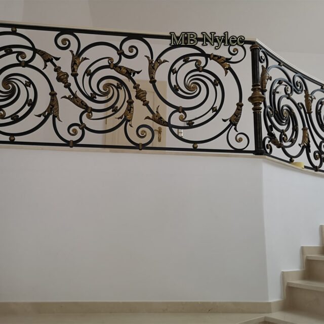 Detail of a wrought railing scroll panel
